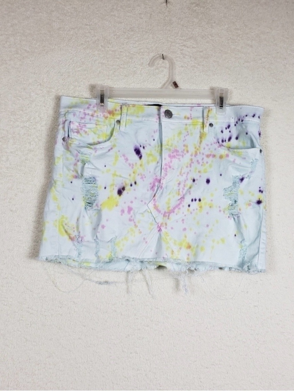 Express tie dye splatter distressed jean skirt